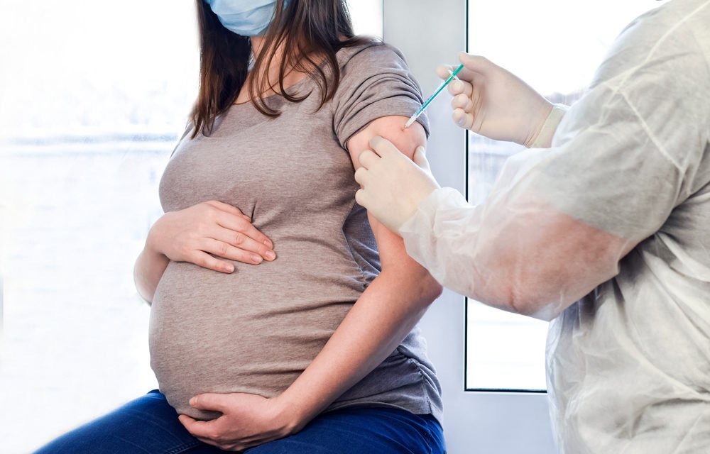 Pregnant,Vaccination.,Pregnant,Woman,In,Face,Mask,Getting,Vaccinated,In