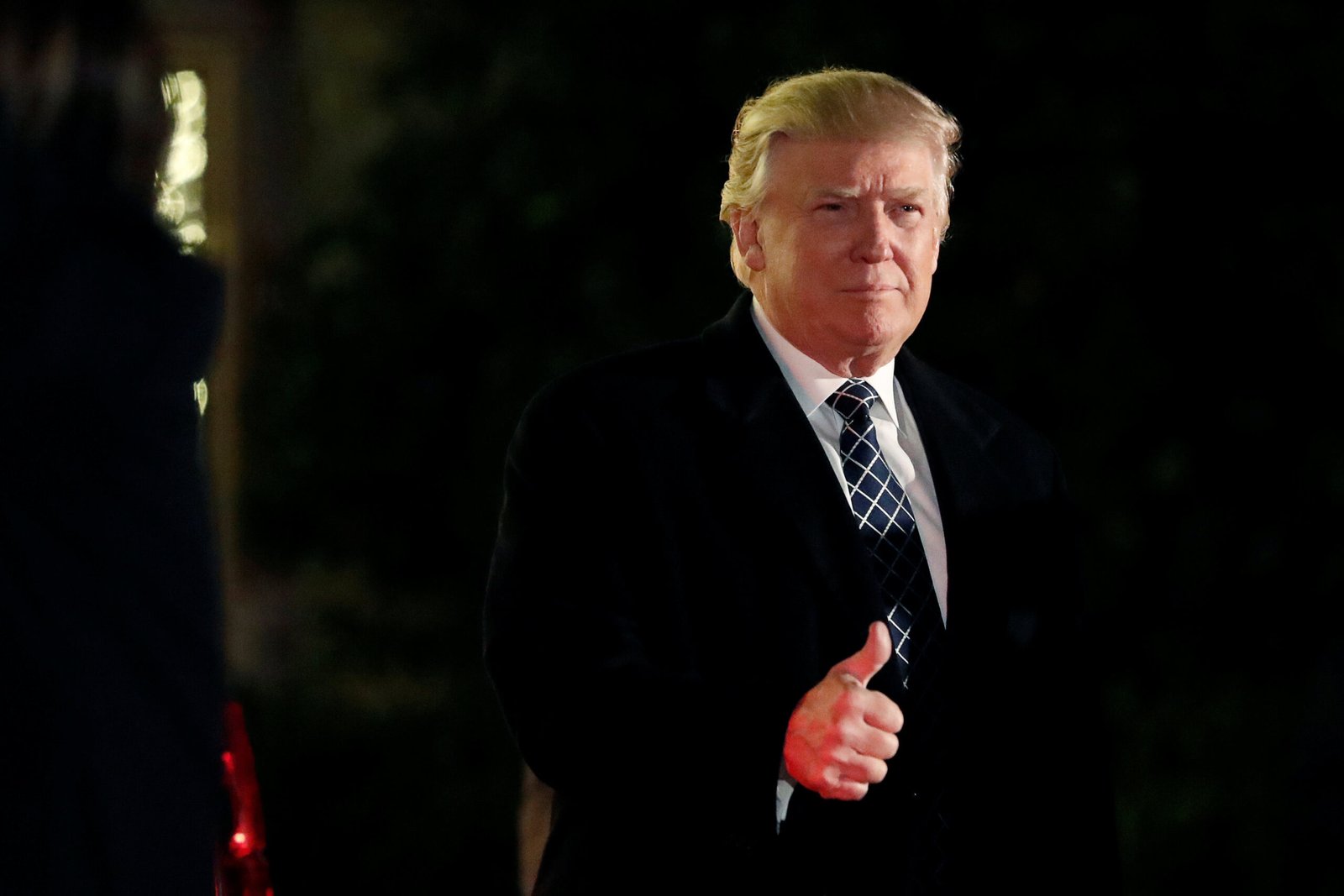 U.S. President-elect Donald Trump arrives at a costume party at the home of hedge fund billionaire and campaign donor Robert Mercer in Head of the Harbor