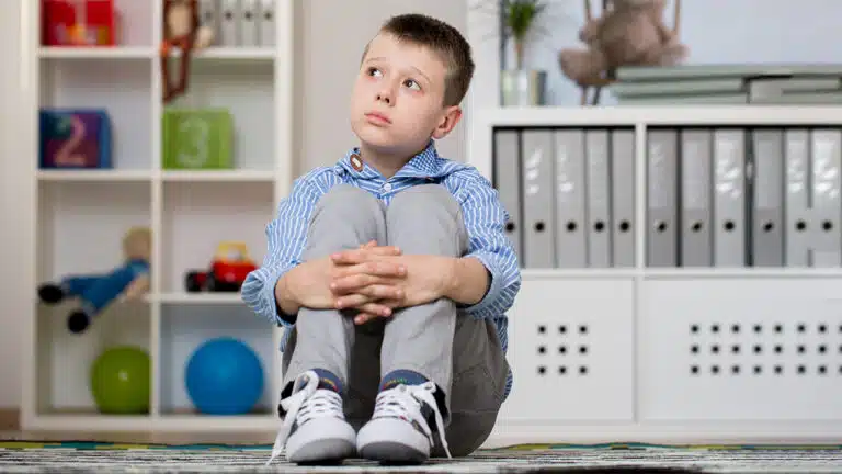 Autistic child with his therapist