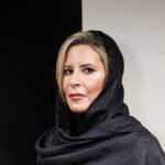 Aisha Gaddafi, daughter of Libya's former leader Muammar Gaddafi, attends an exhibition of her artworks in Moscow